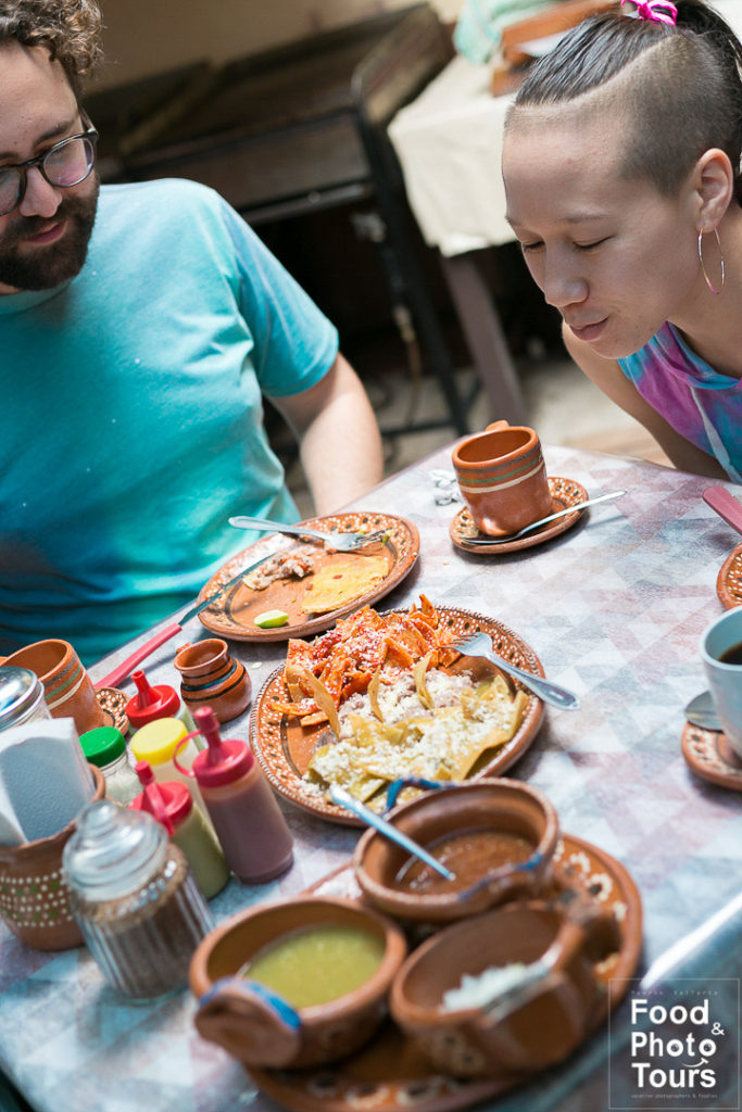 A Millenials couple taking a Food Tour in Puerto Vallarta at a working class neighborhood called Pitillal.