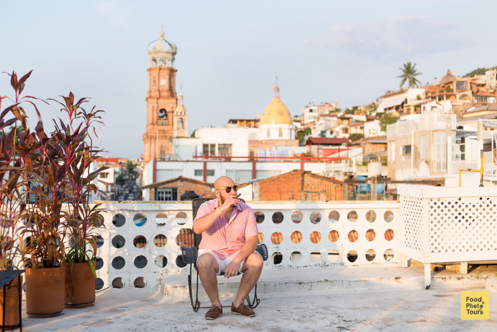 American millenial male solo traveler in a photo shoot in Puerto Vallarta Downtown