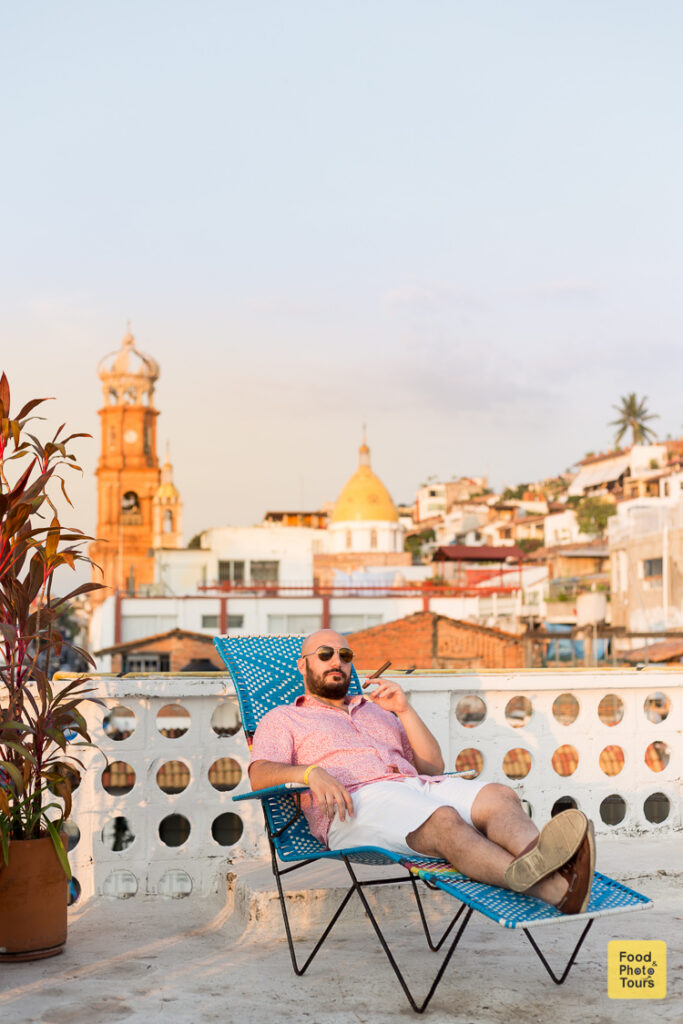 American millenial male solo traveler in a photo shoot in Puerto Vallarta Downtown