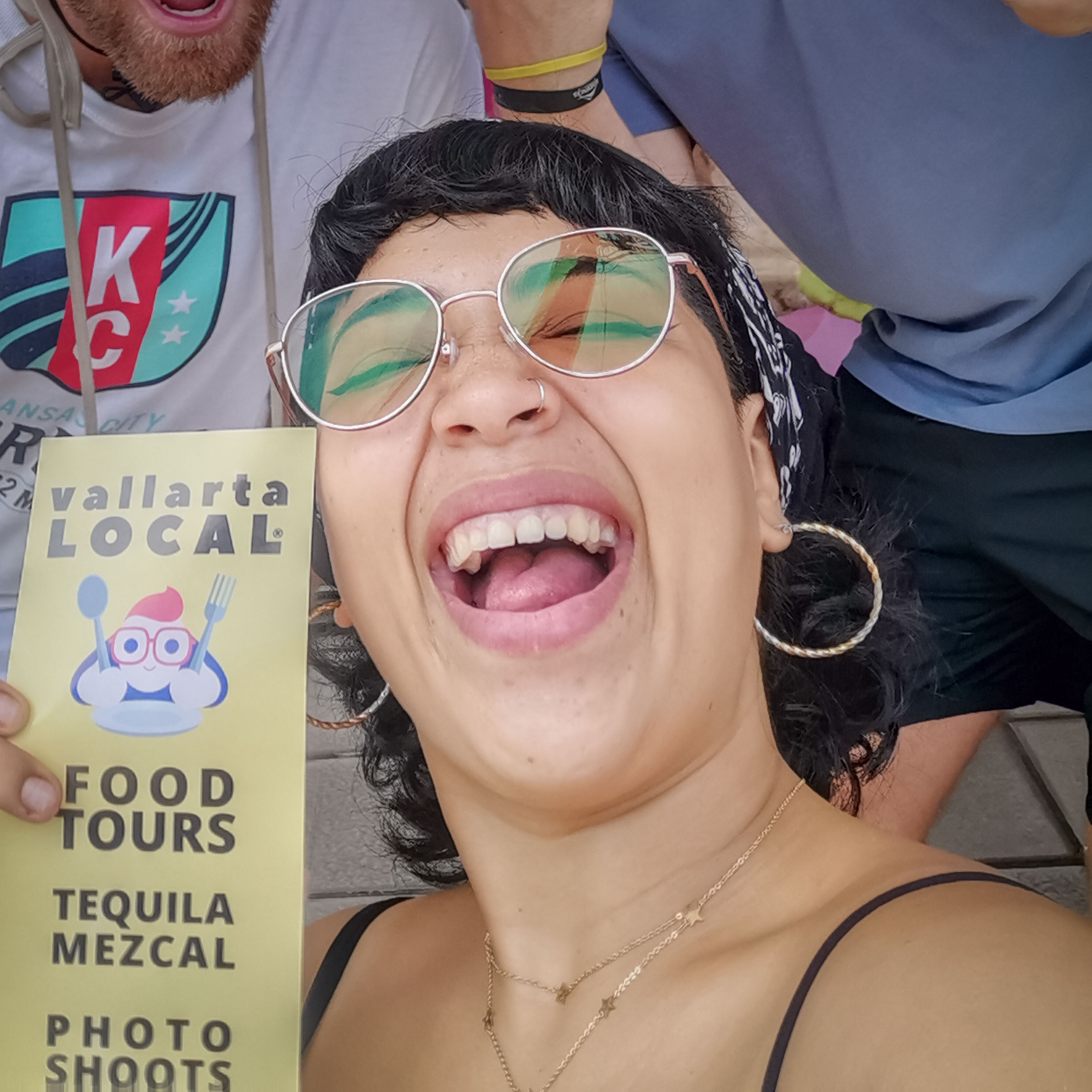 Mexican Female Foodie Guide showing a flyer about a Food Tour in Puerto Vallarta